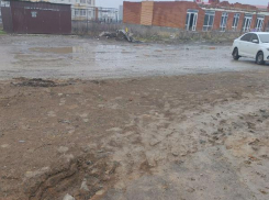 Виноват климат: власти Таганрога объяснили вопиющие кондиции дороги на 1-м Новом