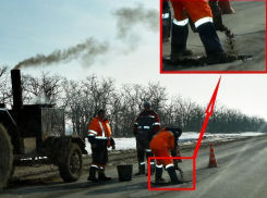 Ведро – главное орудие по ремонту трассы под Таганрогом