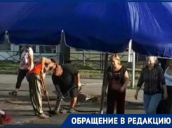 «Неужели нельзя сделать с первого раза?»: как меняют асфальт в районе рынка