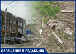 Яму из-под туалета и металлолом оставили строители торгового комплекса Таганрога