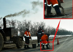Ведро – главное орудие по ремонту трассы под Таганрогом